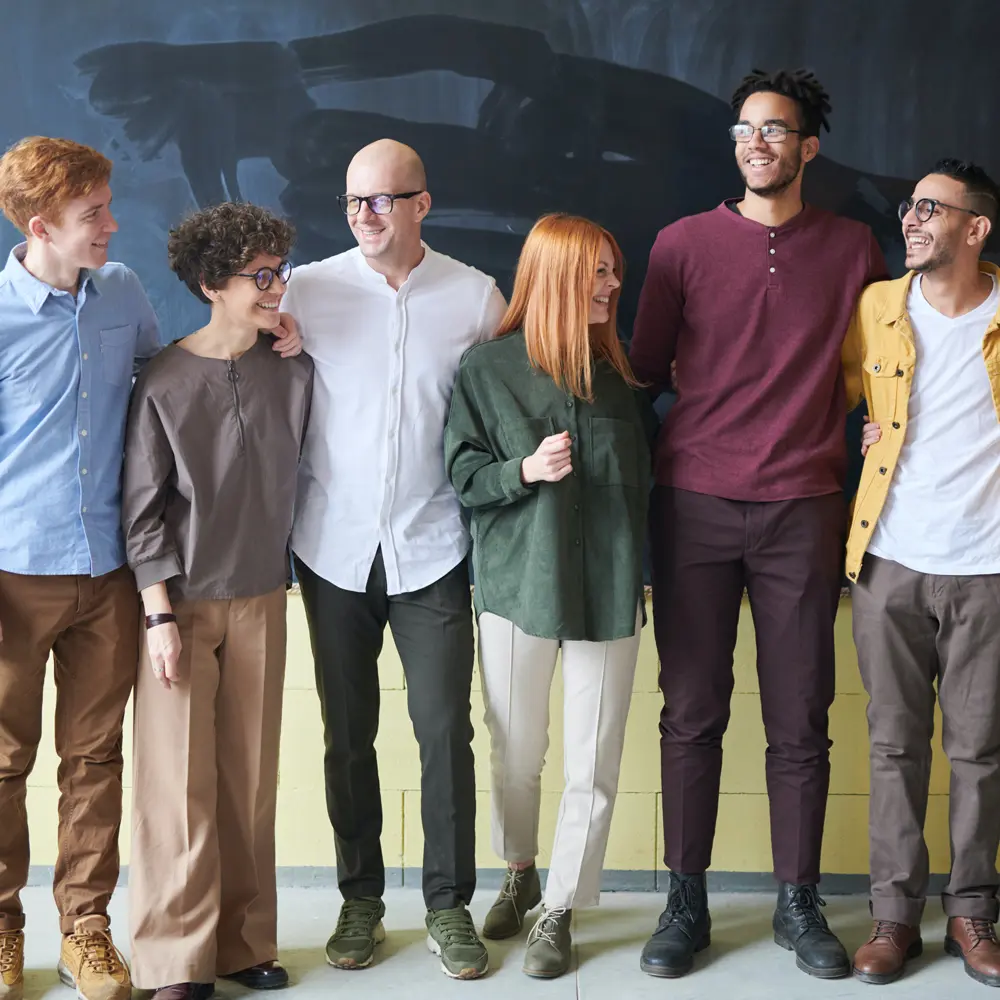 diverse group of people smiling and laughing together